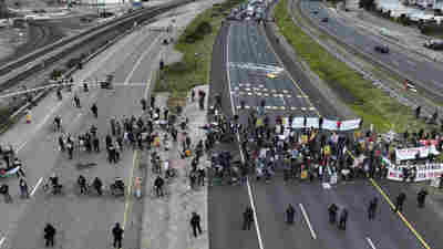 Pro-Palestinian demonstrators shut down airport highways and bridges in major cities