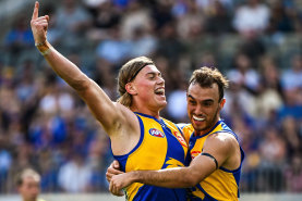 Harley Reid celebrates a goal in West Coast’s win over Richmond. He will need to keep dominating to earn a big wage in this third season. 