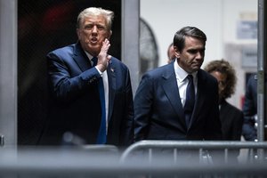 Former President Donald Trump speaks alongside attorney Todd Blanche as they return from a lunch break in his trial at Manhattan criminal court in New York on Thursday, April 18, 2024.