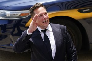 FILE - Tesla CEO Elon Musk departs from the justice center in Wilmington, Del., Tuesday, July 13, 2021.