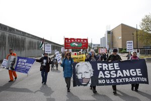 Activists marking five years since the arrest of Wikileaks founder Julian Assange demonstrate outside Belmarsh Prison in London, Sunday, April 14, 2024. U.S. President Joe Biden said last week that he is considering a request from Australia to drop the decade-long U.S. push to prosecute Assange for publishing a trove of American classified documents. Assange is currently fighting extradition to the U.S. from Belmarsh, where he is being held.