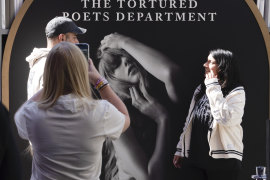 Taylor Swift fans take selfies at a new pop-up opening to celebrate Taylor Swift’s upcoming album “The Tortured Poets Department,” at the Grove in Los Angeles on Wednesday, April 17, 2024. (AP Photo/Richard Vogel)