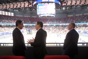 U.S. Secretary of State Antony Blinken talks with U.S. Ambassador to China Nicholas Burns, center, with U.S. Consulate General in Shanghai Scott Walker, right, while attending a basketball game between the Shanghai Sharks and the Zhejiang Golden Bulls at the Shanghai Indoor Stadium, Wednesday, April 24, 2024, in Shanghai, China.