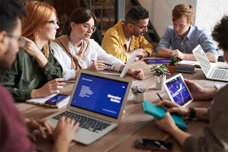 People meeting with computers