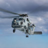 A MH-60R Seahawk Helicopter had flares dropped in front of it by a Chinese fighter jet. 