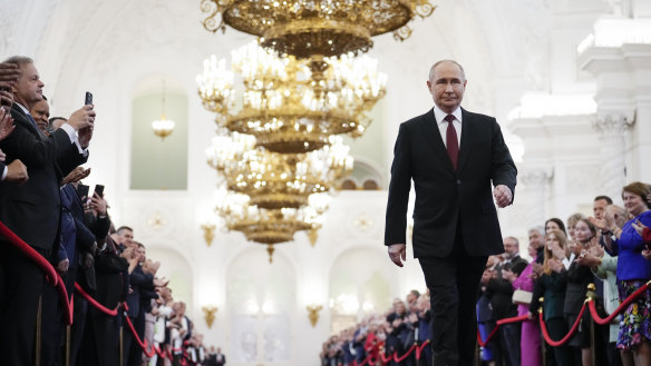 Vladimir Putin walks to take his oath as Russian president during an inauguration ceremony in the Grand Kremlin Palace in Moscow.