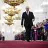 Vladimir Putin walks to take his oath as Russian president during an inauguration ceremony in the Grand Kremlin Palace in Moscow.