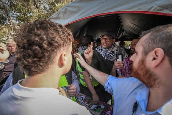 Palestinian and Israeli supporters confront each other at Monash University on Wednesday.