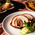 Lechon, stuffed with fragrant lemongrass and spice, is a sound rendition of a classic.