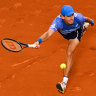 Alex de Minaur plays a forehand in beating Rafael Nadal in Barcelona.