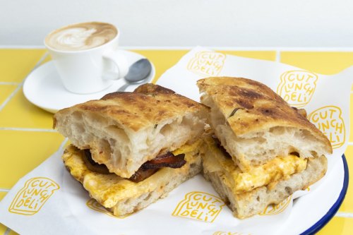 Cut Lunch Deli. Bacon, egg and cheese focaccia with chilli oil mayo. Randwick, August 23, 2022. Photo: Rhett Wyman/SMH .