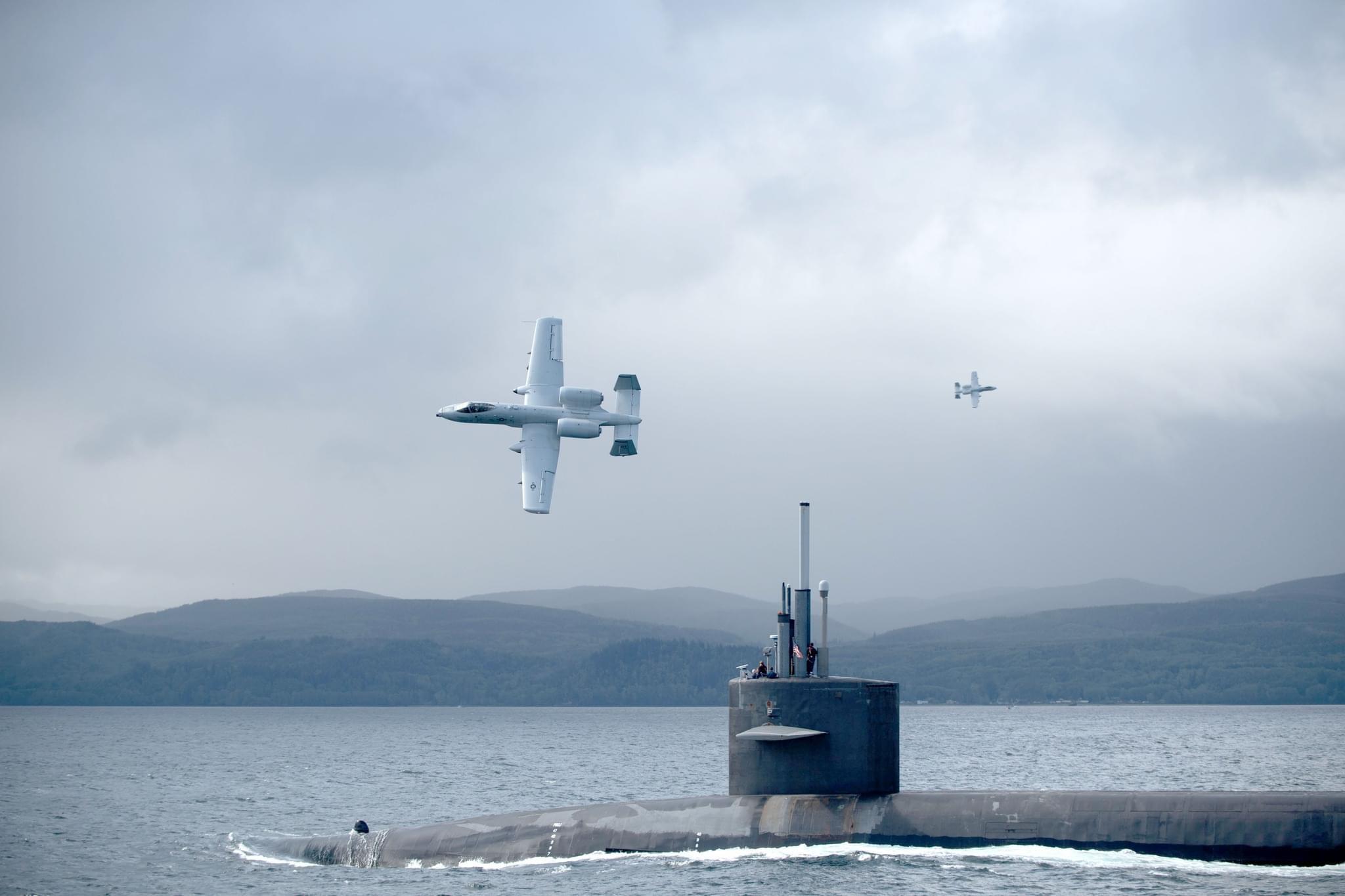 r/pics - A-10s escorting the USS Nebraska