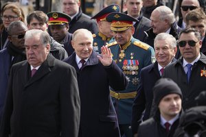 President of the Republic of Tajikistan Emomali Rahmon, front left, Russian President Vladimir Putin, centre, Russian Defense Minister Sergei Shoigu, centre right, President of the Republic of Uzbekistan Shavkat Mirziyoyev, second right, and the President of the Kyrgyz Republic Sadyr Japarov, right, leave Red Square after the Victory Day military parade in Moscow, Russia, Thursday, May 9, 2024, marking the 79th anniversary of the end of World War II. (AP Photo/Alexander Zemlianichenko)