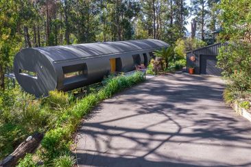 charred fallen log inspired 1.8m tube house for sale domain