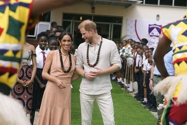 Prince Harry and Meghan visit children at the Lights Academy in Abuja, Nigeria, Friday, May 10, 2024.   