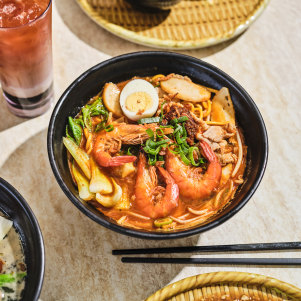 Deeply savoury prawn noodle soup ($16) .