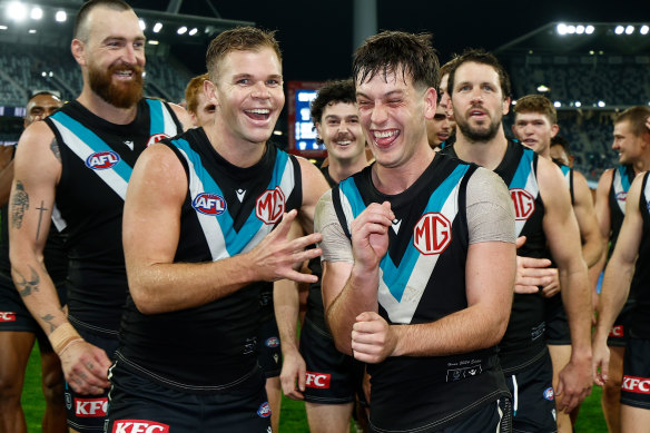 Dan Houston (left) and Zak Butters of the Power celebrate.