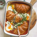 Shakshuka meets savoury bread-and-butter pudding in this share-friendly brunch dish.