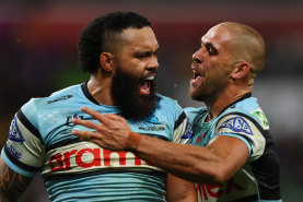 Siosifa Talakai celebrates his try against the Storm.