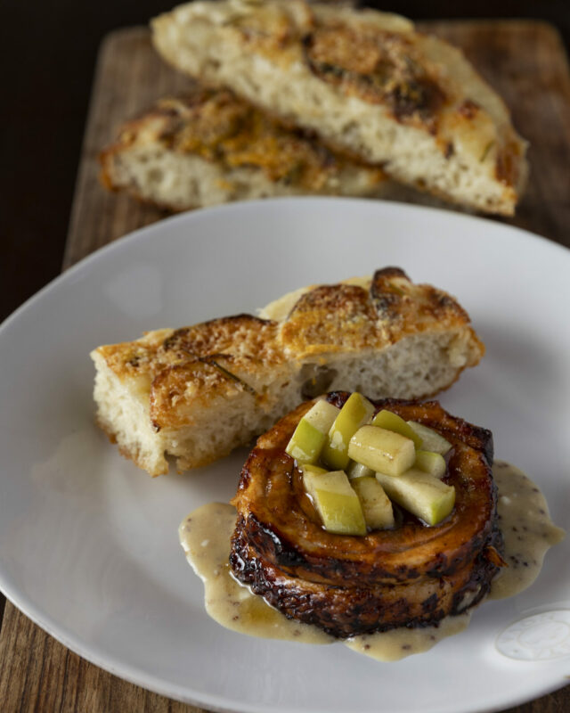 Pork belly with braaied apples and focaccia