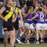 The Bulldogs celebrate another goal against the Tigers on Saturday night.