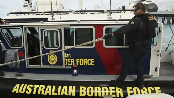 Australian Border Force (ABF) marine tactical officer Michael Kingston on a fast response boat patrolling off Thursday Island. The ABF has increased their presence in the Torres Strait as a part of Operation Overarch that was designed to protect the Torres Strait protected zone. Torres Strait Treaty normally allows people to travel freely back and forth between the Torres Strait and PNG Treaty villages but this has been suspended due to the COVID-19 threat and both countries closing their borders. Daily life Saibai island, vaccination, Australian Border Force, Operation Overarch. Climate Change. Thursday Island, Torres Strait. 2nd June, 2021. Photo: Kate Geraghty 

