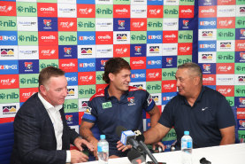 Knights coach Adam O’Brien, Kalyn and Andre Ponga at the 2022 press conference announcing the star’s extension with the club.