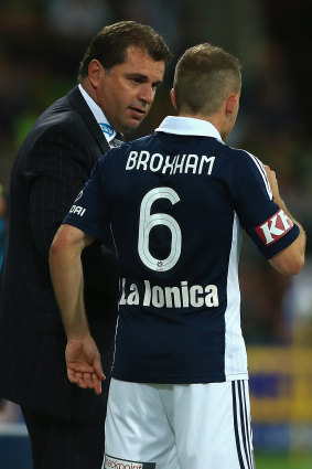 Then Melbourne Victory coach Ange Postecoglou with Leigh Broxham. 