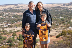 Former Hawthorn player Chance Bateman with his wife and family.