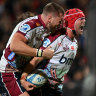 Harry Wilson celebrates after scoring a try in the Reds’ win over the Crusaders.