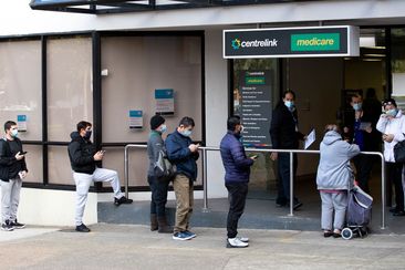 The queue for Centrelink in Campsie stretches down the street