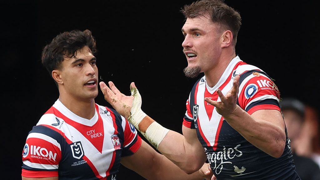 Angus Crichton celebrates scoring a try.