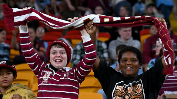 BRISBANE, AUSTRALIA - MAY 16: Queensland fans show their support during game one of the 2024 Women’s State of Origin series between Queensland and New South Wales at Suncorp Stadium on May 16, 2024 in Brisbane, Australia. (Photo by Bradley Kanaris/Getty Images)