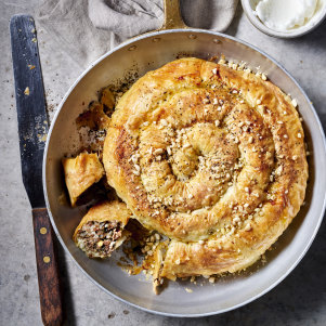 Serve this lamb, rice and vine leaf borek with garlic dip.