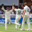 Alex Carey and Pat Cummins celebrate Jonny Bairstow’s wicket.