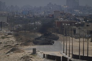 Israeli army tanks are seen in the central Gaza Strip, Saturday, May 18, 2024.