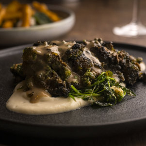 The steak-like lion’s mane mushroom dish.