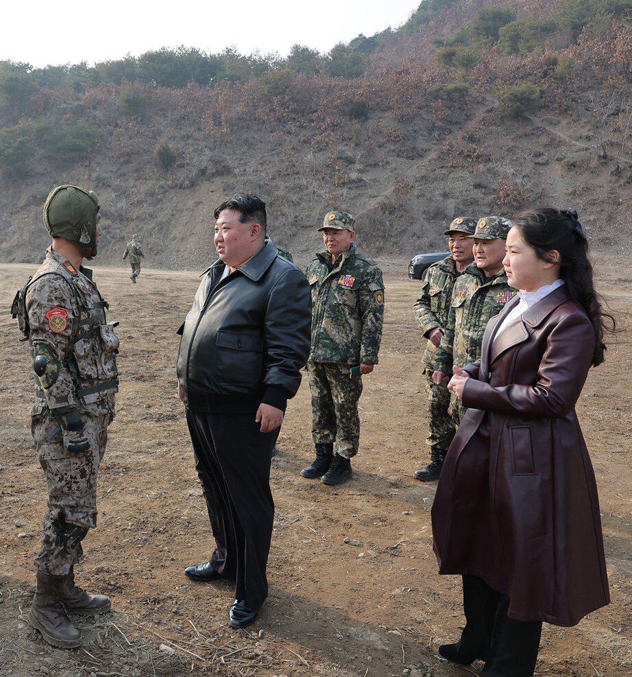 r/pics - Kim Jong Un and his daughter on military training grounds 