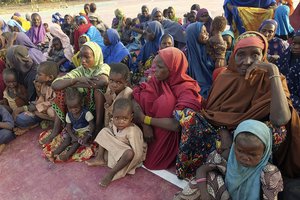 Women and children who were held captive by islamic extremists, and rescued by the Nigerian army, are seen upon arrival in Maiduguri, Nigeria, Monday, May 20, 2024. Hundreds of hostages mostly children whose mothers were held captive and forcefully married by Islamic extremists in northeastern Nigeria have been rescued from their key forest enclave and handed over to authorities, the West African nation's army said late Monday. (AP Photo/Jossy Olatunji)