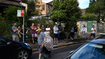 Buyers wait for an auction in Sydney.