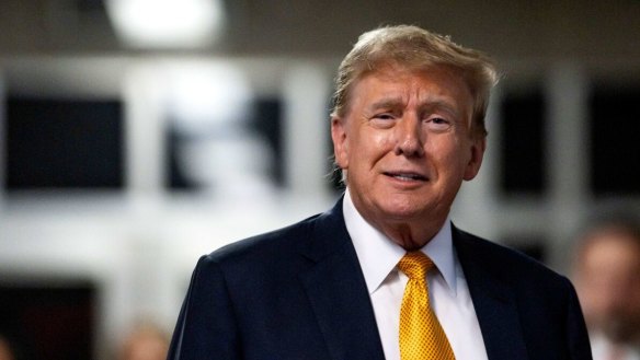 Donald Trump speaks to members of the media at Manhattan criminal court in New York.