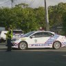 A man is fighting for his life while another is in custody after an alleged stabbing near a Brisbane school.