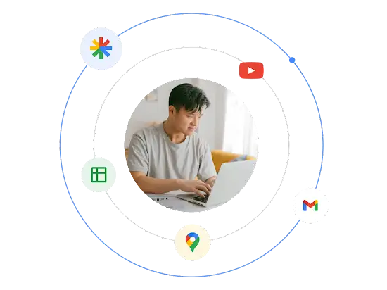 A man using a laptop is surrounded by an illustrated ecosystem of Google ad format types.