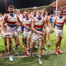 Marcus Bontempelli (L) and Taylor Duryea (R) of the Bulldogs celebrate their victory ove GWS.