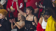 Taylor Swift (centre) wears a corset by Australian Dion Lee at the Super Bowl.