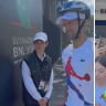 Novak Djokovic wore a bike helmet on his return to the Italian Open after he was hit by a fan's aluminium water bottle while signing autographs a day earlier.