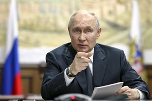 Russian President Vladimir Putin gestures as he speaks at a meeting on tourism development via videoconference during his working visit to Dagestan Republic, in Derbent, Russia, Wednesday, June 28, 2023