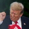 Former US President Donald Trump dances during a campaign event at Crotona Park in the Bronx.