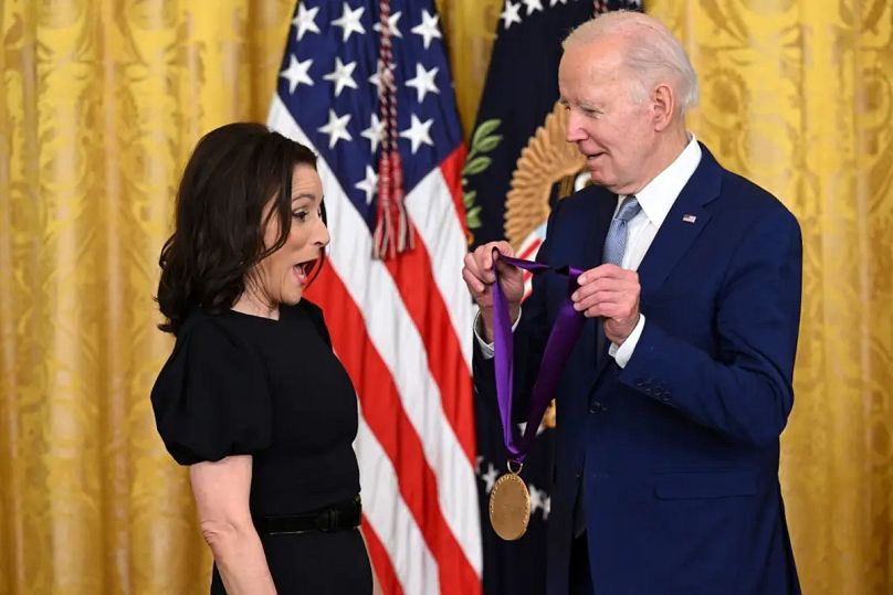 r/photoshopbattles - PsBattle: Julia Louis-Dreyfus recieves National Medal of Arts from President Biden