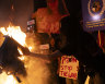 Israeli protesters set a fire during a demonstration in Tel Aviv on Saturday  against Prime Minister Benjamin Netanyahu, calling for deal to secure the release of hostages.